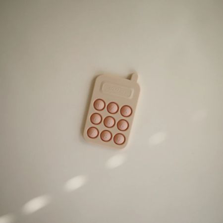 Jucarie senzoriala din silicon in forma de Telefon, +10 luni, Blush, Mushie 605225