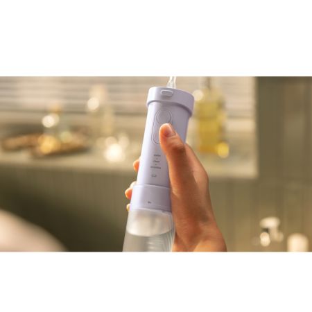 Dus bucal portabil Sonicare Compact Flosser 1000, Mov, HX3333/23, Philips 733136