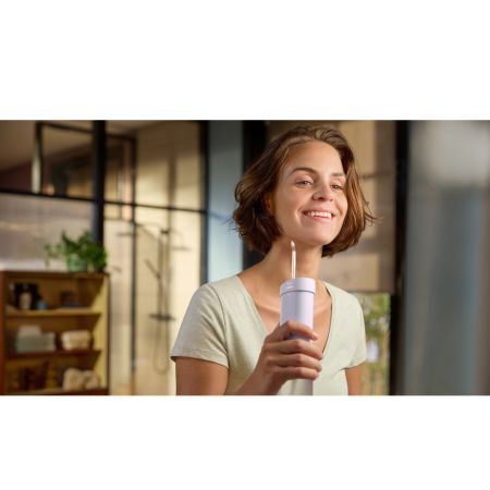 Dus bucal portabil Sonicare Compact Flosser 1000, Mov, HX3333/23, Philips 733133