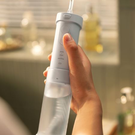 Dus bucal portabil Sonicare Compact Flosser 1000, Albastru, HX3333/24, Philips 733148