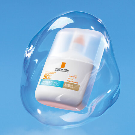 Serum de fata cu protectie solara SPF 50+ Anthelios UVAir, nuanta medie natural, 50 ml, La Roche-Posay 756711