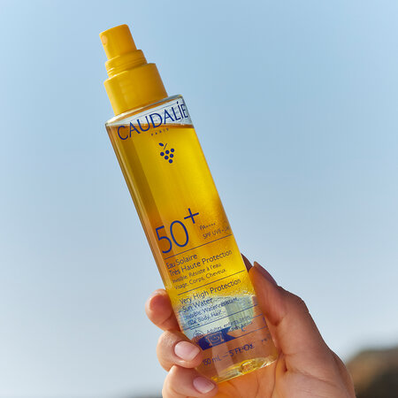 Apa bifazica cu protectie solara invizibila SPF50+ Suncare, 150 ml, Caudalie 824421