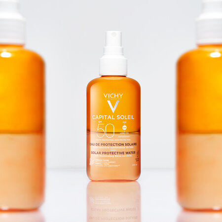 Apa de protectie solara pentru un bronz sporit SPF50+ Capital Soleil, 200 ml, Vichy 555669